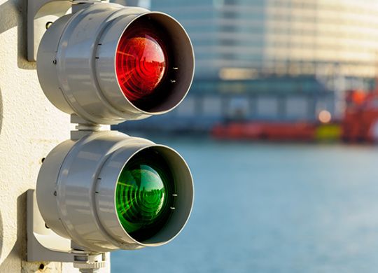 Traffic signal for boats at marina in Bacelona.